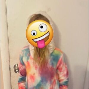 It’s a large in kids with a sparkly hoodie and pocket